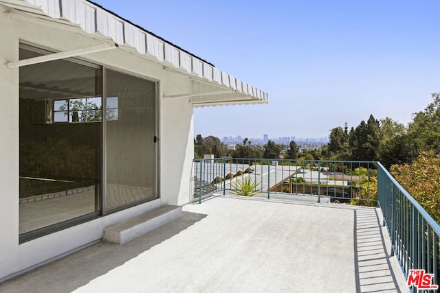 view of patio / terrace featuring a balcony