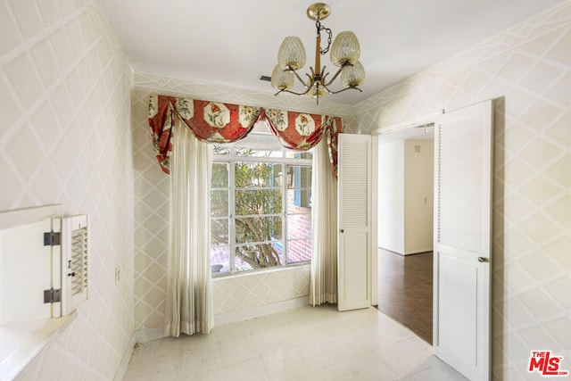 dining space with a chandelier