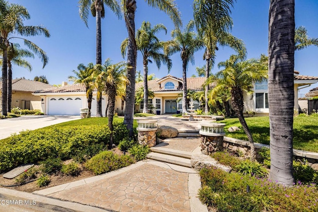 view of front of property with a garage