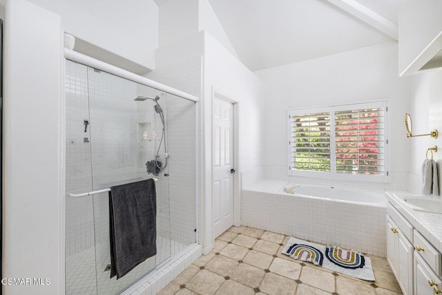 bathroom featuring vanity and plus walk in shower