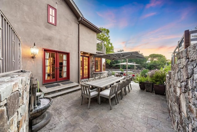 patio terrace at dusk with french doors