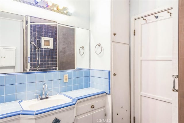 bathroom with decorative backsplash and vanity