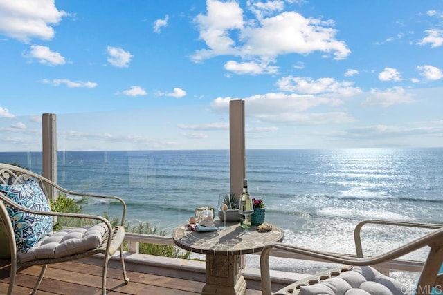 balcony featuring a water view