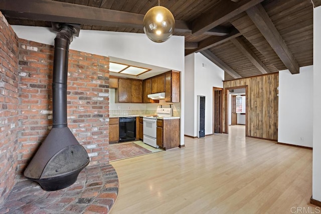 kitchen featuring brown cabinets, black dishwasher, white range with electric stovetop, light countertops, and a wood stove