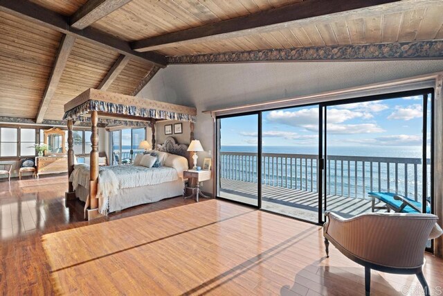 bedroom featuring lofted ceiling with beams, a water view, access to outside, hardwood / wood-style floors, and wooden ceiling