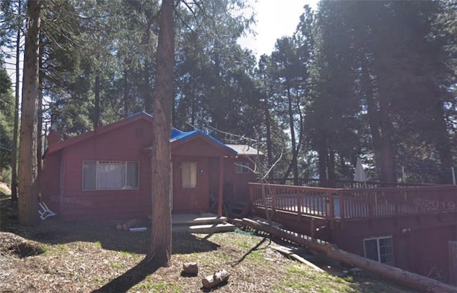 21450 Crest Forest Dr, Crestline, CA 92325 - back of house with a wooden deck