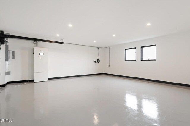 empty room with concrete flooring