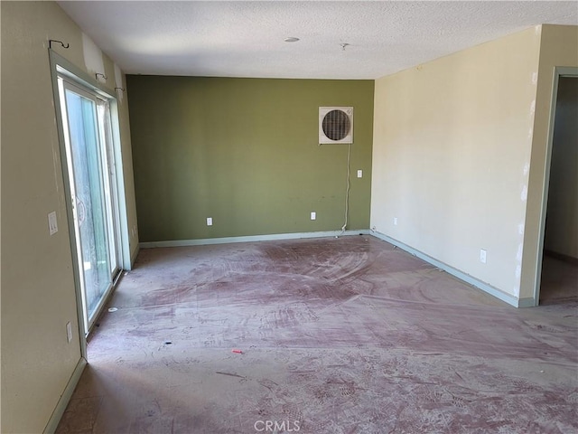 31801 Soapmine Rd, Barstow, CA 92311 - carpeted spare room with a textured ceiling
