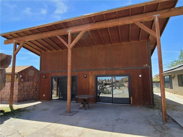 back of house with a patio area