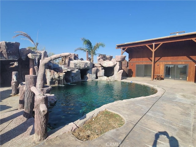 31801 Soapmine Rd, Barstow, CA 92311 - outdoor pool featuring a patio