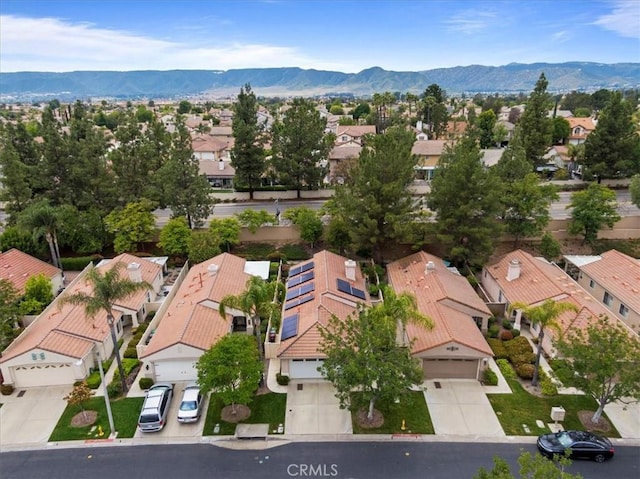 birds eye view of property featuring a mountain view and a residential view