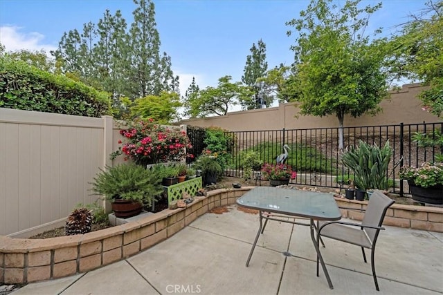 view of patio / terrace with fence