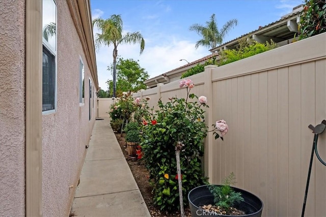 view of patio / terrace featuring fence