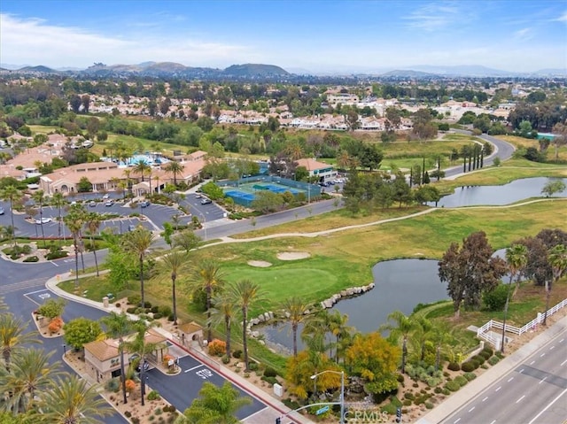 bird's eye view with golf course view and a water view