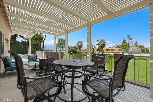 view of patio with a pool and a pergola