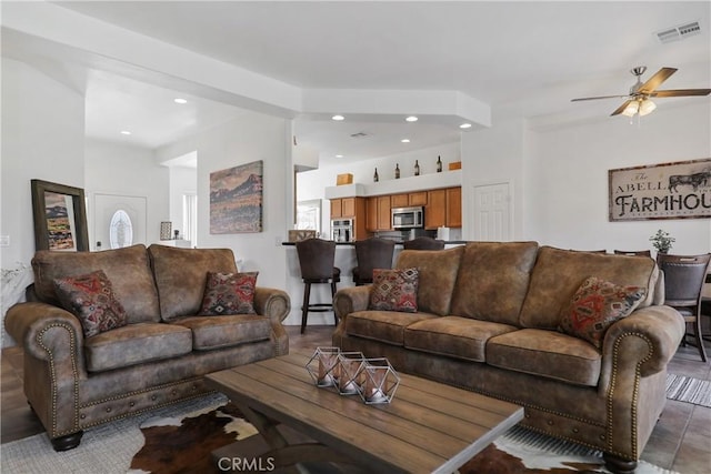 living room featuring ceiling fan