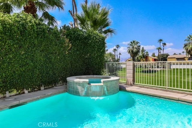 view of pool featuring an in ground hot tub