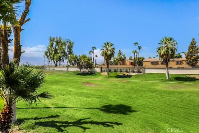 view of home's community featuring a yard