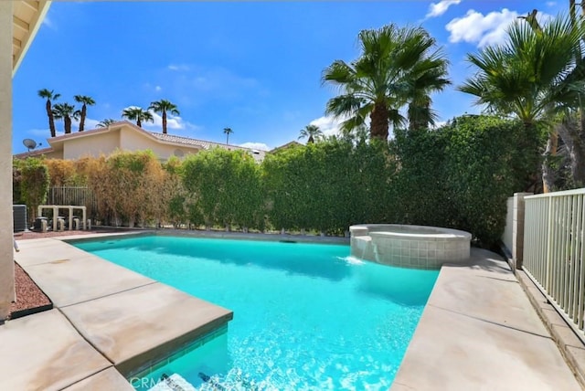 view of swimming pool with a bar and an in ground hot tub