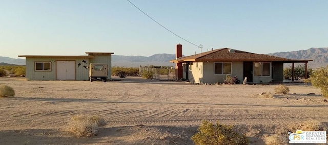 view of front facade with a mountain view