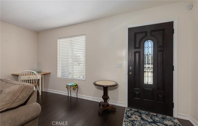 entrance foyer with dark hardwood / wood-style floors