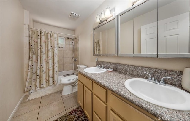 full bathroom featuring tile patterned floors, vanity, toilet, and shower / bathtub combination with curtain