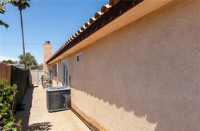 view of property exterior with central air condition unit