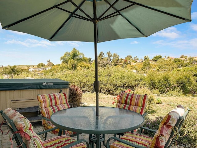 view of patio featuring a hot tub