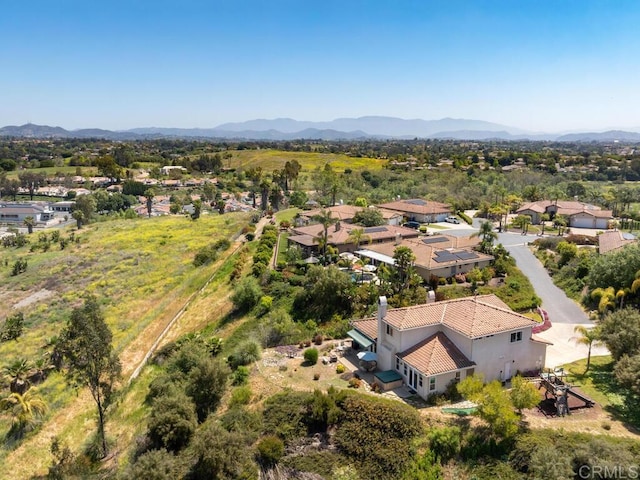 drone / aerial view featuring a mountain view