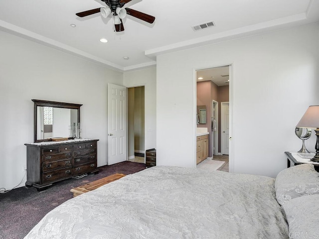 carpeted bedroom featuring ceiling fan and connected bathroom