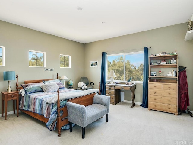 bedroom with light carpet