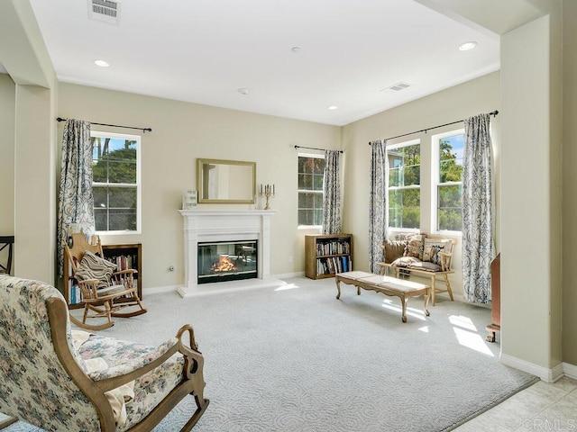 sitting room with light colored carpet