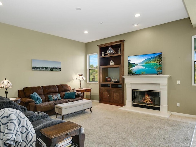 living room with light colored carpet