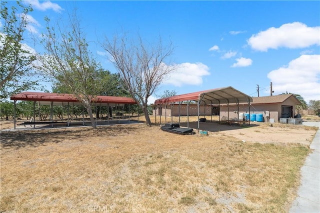 view of yard featuring a carport