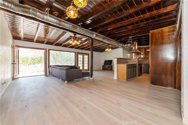 unfurnished living room with wood ceiling, lofted ceiling with beams, and hardwood / wood-style flooring