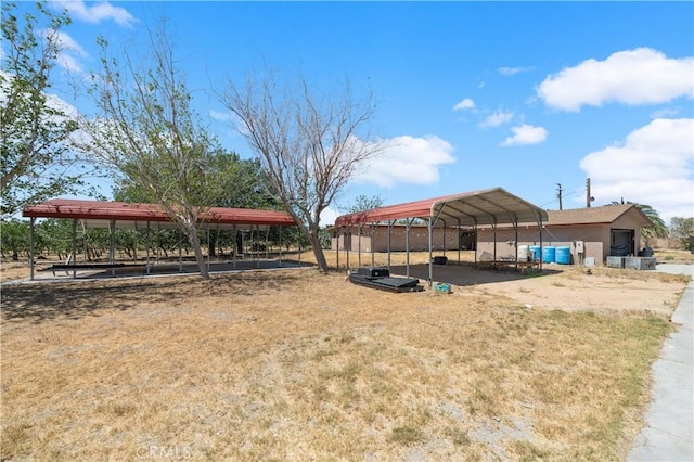 view of yard featuring a carport