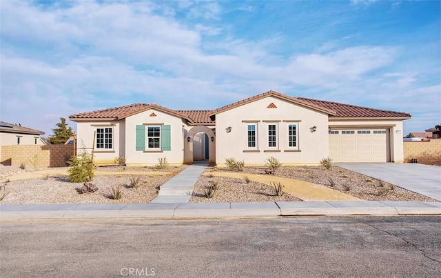 12925 Davona Dale Rd, Apple Valley, CA 92308 - mediterranean / spanish house featuring a garage
