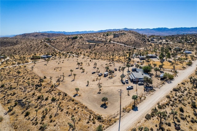 bird's eye view with a mountain view