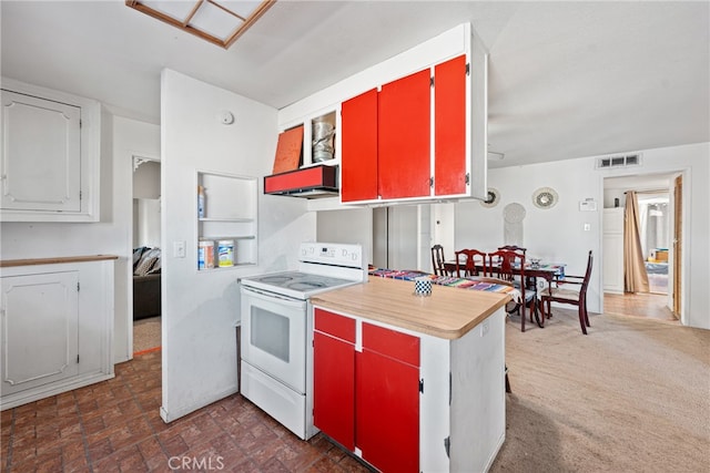 kitchen with electric stove and dark colored carpet