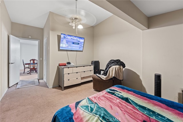 bedroom featuring ceiling fan and light colored carpet