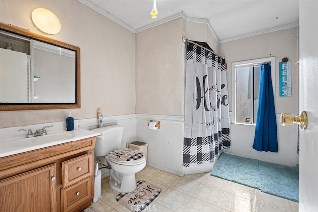 bathroom featuring a textured ceiling, toilet, vanity, crown molding, and curtained shower