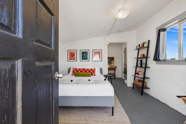 bedroom with vaulted ceiling