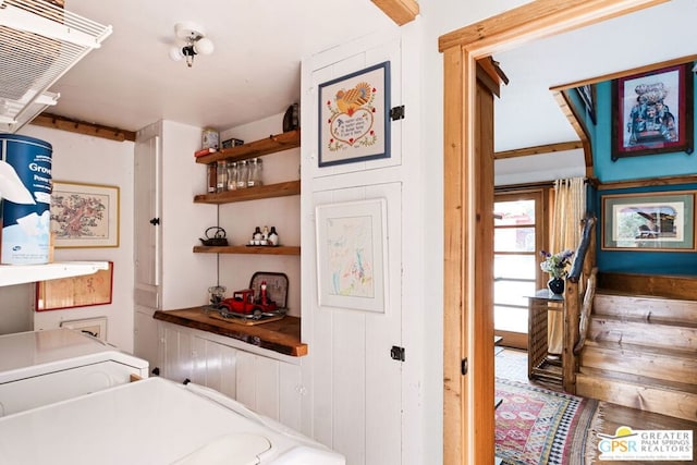 laundry area featuring hardwood / wood-style floors