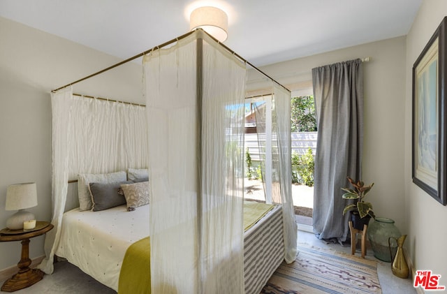 bedroom featuring hardwood / wood-style flooring