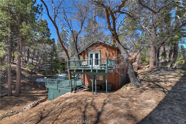 view of front of house with a wooden deck