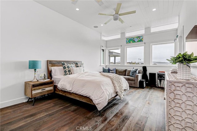 bedroom featuring dark hardwood / wood-style floors and ceiling fan