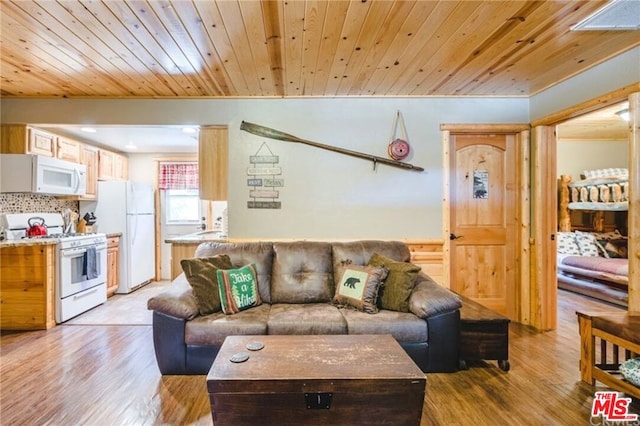 living room with light hardwood / wood-style flooring, wooden ceiling, and ornamental molding