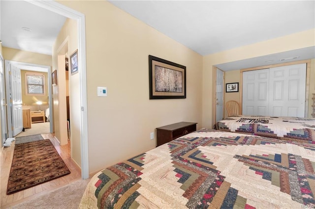 bedroom featuring a closet and carpet floors