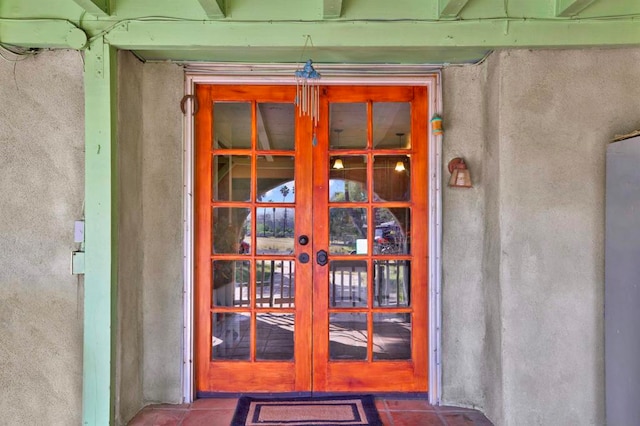 doorway to property featuring french doors