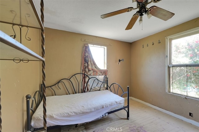 bedroom featuring ceiling fan